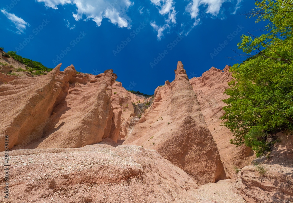 Fototapeta premium Fiastra lake and Lame Rosse canyon - Naturalistic wild attraction in the Monti Sibillini National Park, province of Macerata, Marche region, central Italy