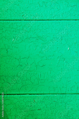 Green wooden wall abstract texture, close-up shot, vertical © Glevalex