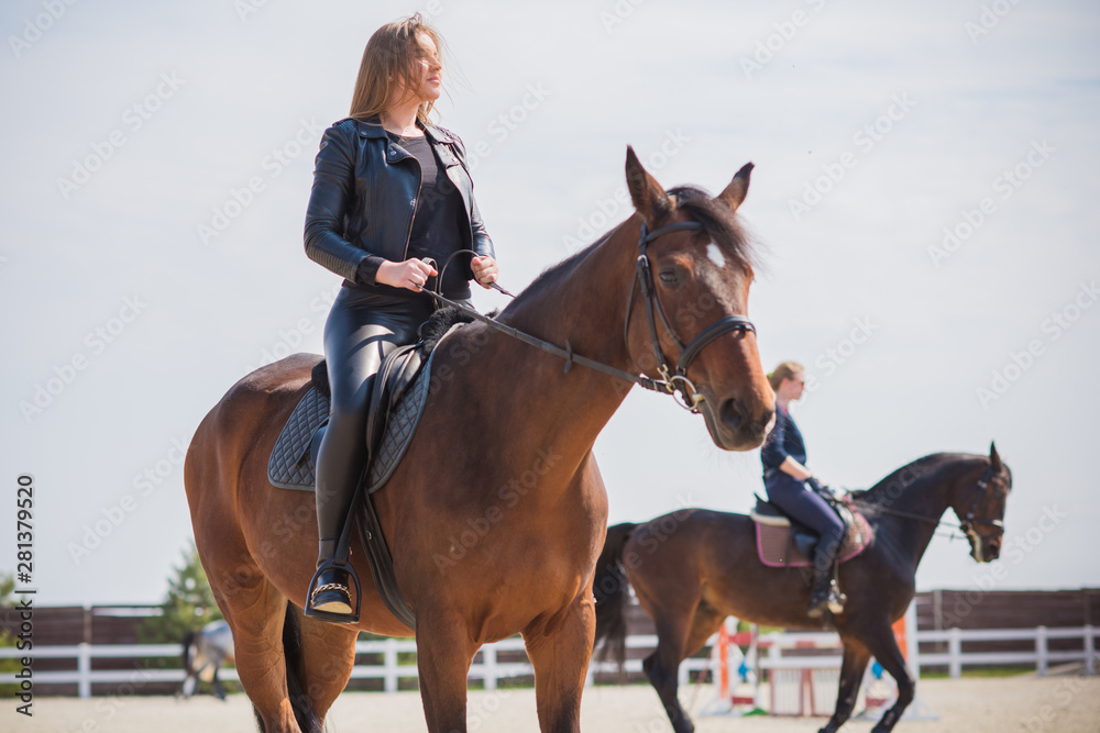Girl with a horse, countryside place, woman talking to her horse. Portrait of riding horse with woman at rancho Girl with a horse, countryside place, woman talking to her horse. Portrait of riding horse with woman at rancho
