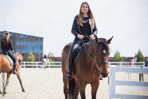 Girl with a horse, countryside place,  woman talking to her horse. Portrait of riding horse with woman at rancho  © T.Den_Team