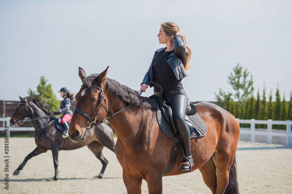 Girl with a horse, countryside place, woman talking to her horse. Portrait of riding horse with woman at rancho Girl with a horse, countryside place, woman talking to her horse. Portrait of riding horse with woman at rancho
