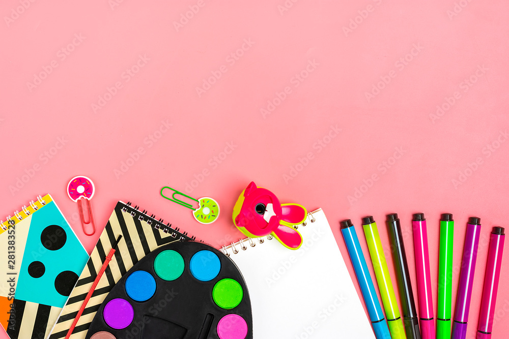 Stationary, back to school, summer time, creativity, education concept.School supplies - dividers, pencils, paper clips, note, stapler, notepad, globe on pink background, flat lay. Mock up Top view