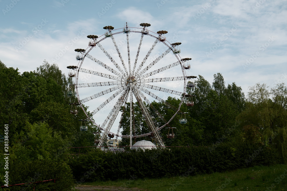 An old metal ferris wheel without people An old metal ferris wheel without people