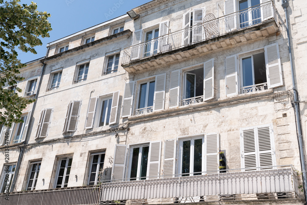 building in city center of La Rochelle in France with balcony