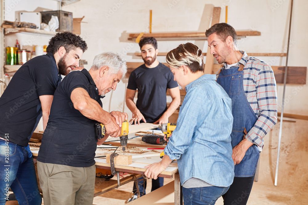 Carpenter master makes apprenticeship training Stock Photo Adobe Stock