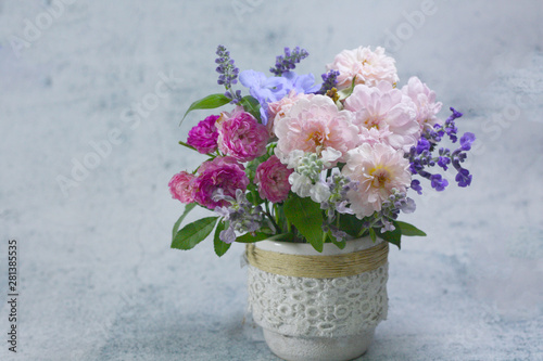 Beautiful rose flower vase background. © swisty242