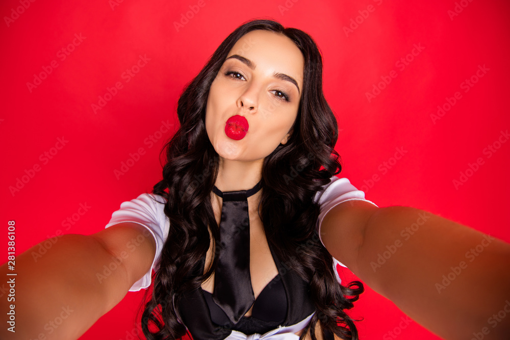Self-portrait of nice-looking attractive gorgeous glamorous lovely lovable cheerful cheery wavy-haired lady sending kiss cupid 14-February isolated over bright vivid shine red background Self-portrait of nice-looking attractive gorgeous glamorous lovely lovable cheerful cheery wavy-haired lady sending kiss cupid 14-February isolated over bright vivid shine red background