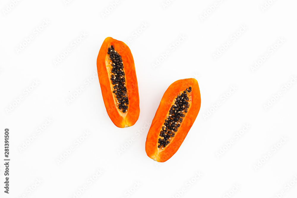 Slice of sweet papaya isolated on white background. Flat lay. Top view