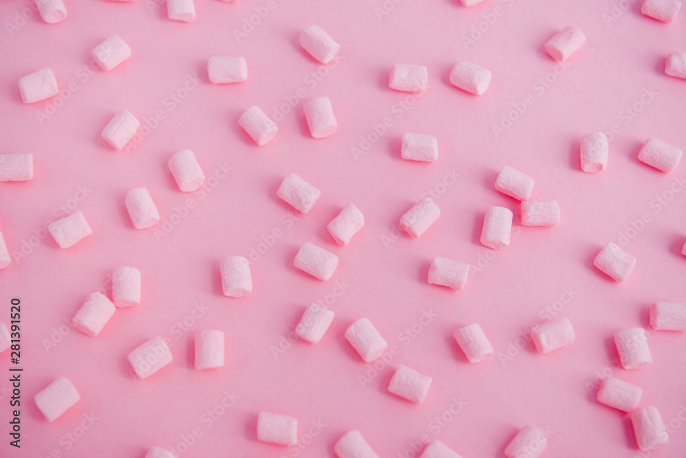 pink mini marshmallows on pink backgrount top view pink mini marshmallows on pink backgrount top view