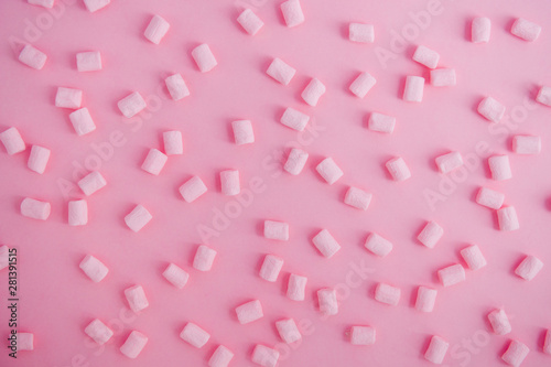 pink mini marshmallows on pink backgrount top view