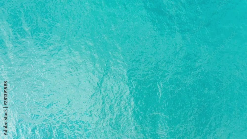 Turquoise blue water of a lake in Switzerland - aerial photography Turquoise blue water of a lake in Switzerland - aerial photography