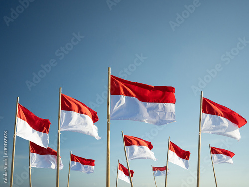 indonesia flags under blue sky independence day concept photo