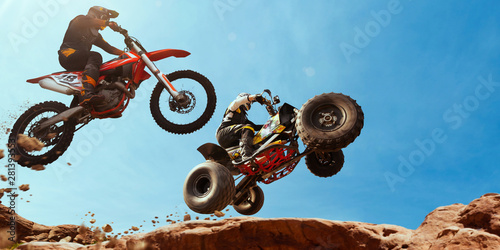 ATV Rider in the action with motocross  rider.