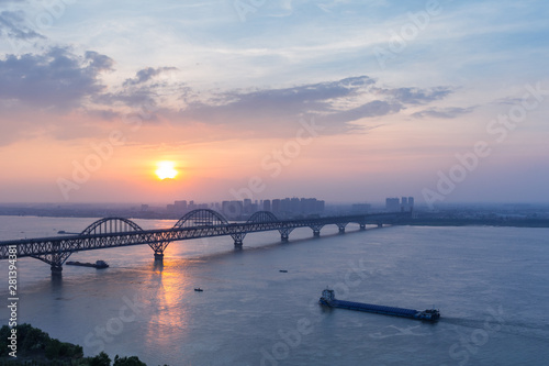 jiujiang yangtze river bridge in sunset