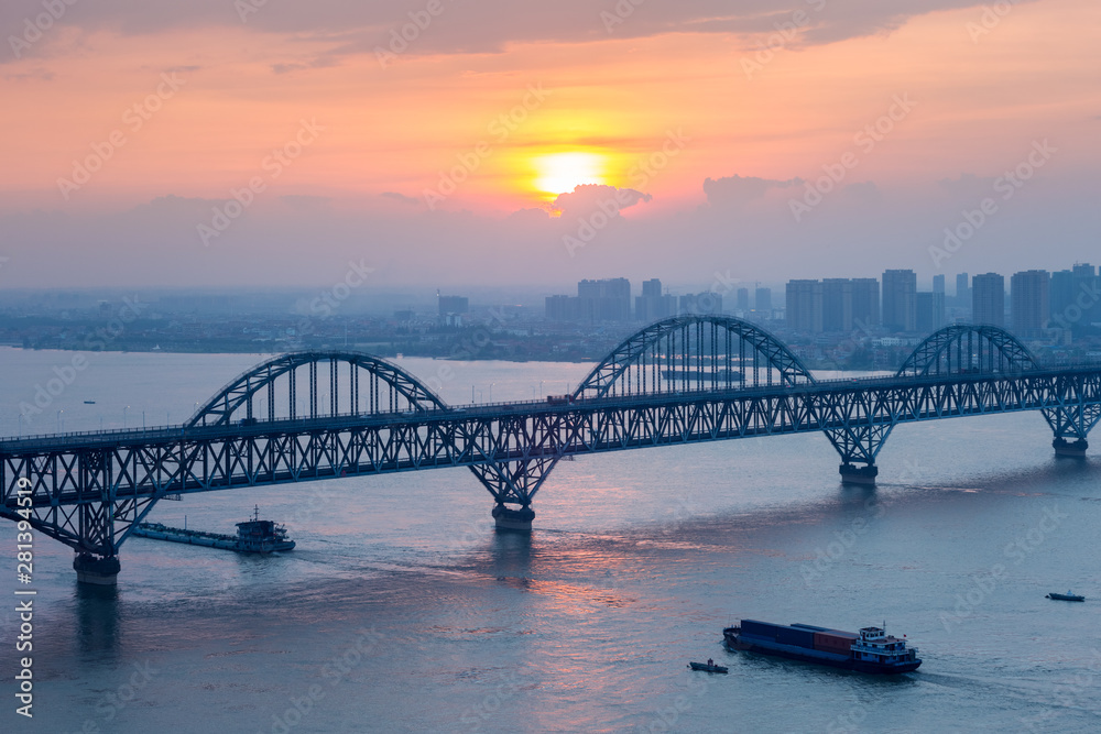 Fototapeta premium jiujiang yangtze river bridge closeup in sunset
