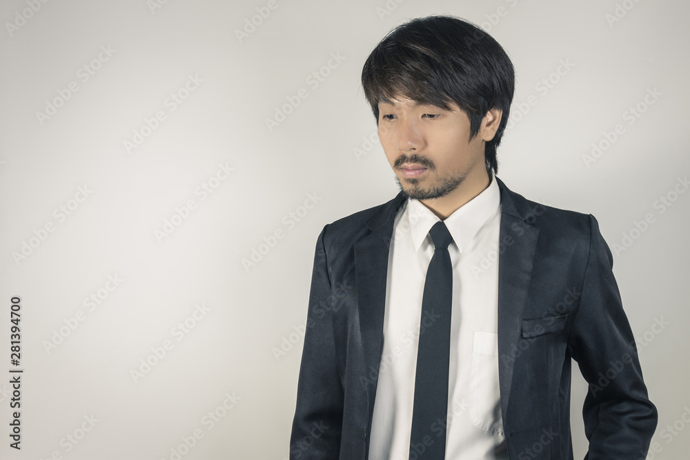 Portrait Businessman in Black Suit on Right Frame in Vintage Tone Portrait Businessman in Black Suit on Right Frame in Vintage Tone