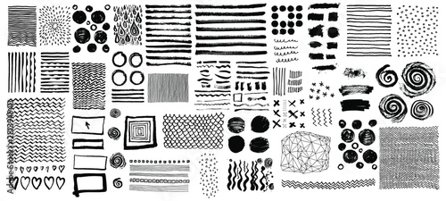 Vector set of grungy hand drawn textures. Lines, circles, crosses, smears, spirals, waves, brush strokes, triangles. Hand drawn elements for your graphic design