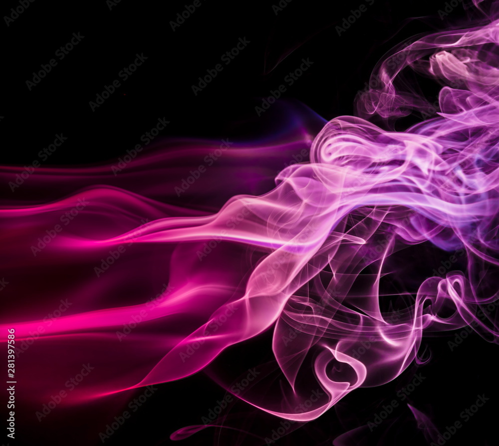 Colored smoke on black background Colored smoke on black background