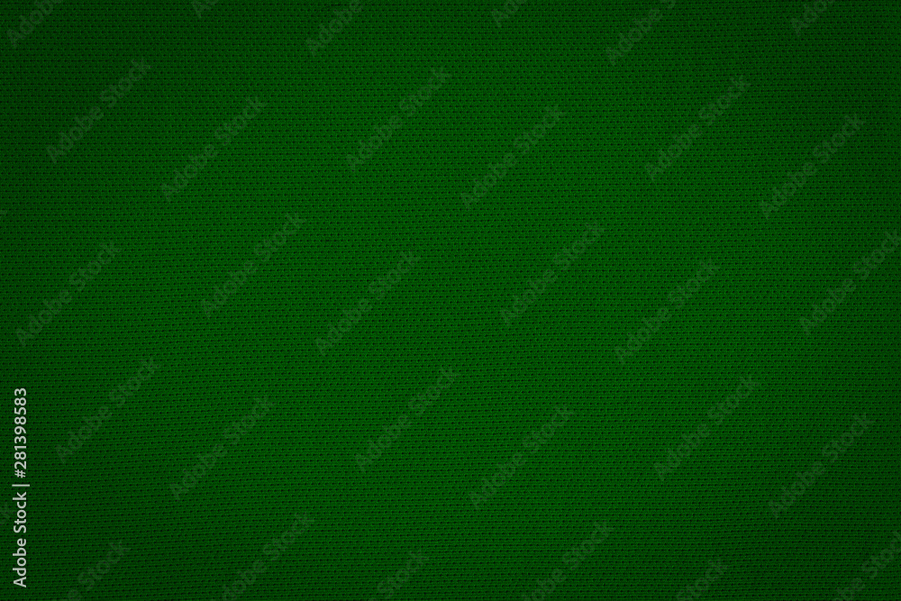 Texture of real dark green knitwear, textile background. Abstract background Texture of real dark green knitwear, textile background. Abstract background
