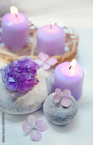 candles  flowers hydrangea  amethyst geode crystal  spa stones on white background. Spa therapy composition.  Ritual for relaxation  meditation. soft selective focus