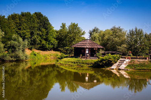 Small wooden house by the lake 