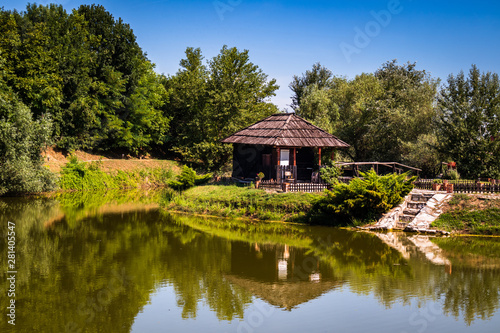 Small wooden house by the lake 