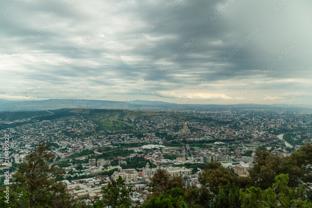 Panoramic view of Tbilisi from Mount Mtatsminda on a cloudy day, Georgia