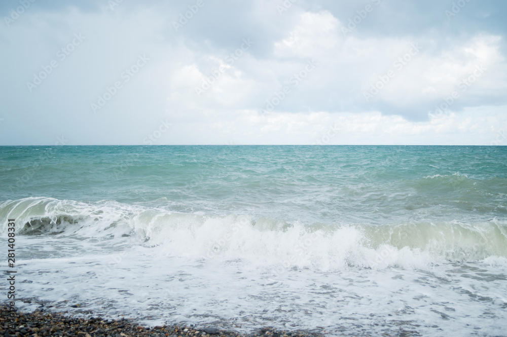 Wave on the beach, sea foam in the sea, storm sea