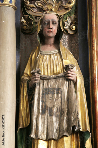 Saint Veronica, statue on the main altar in the Church of Saint Mary Magdalene in Cazma, Croatia photo