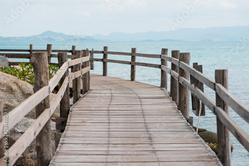 wooden road on the rock blue ocean calm and serenity