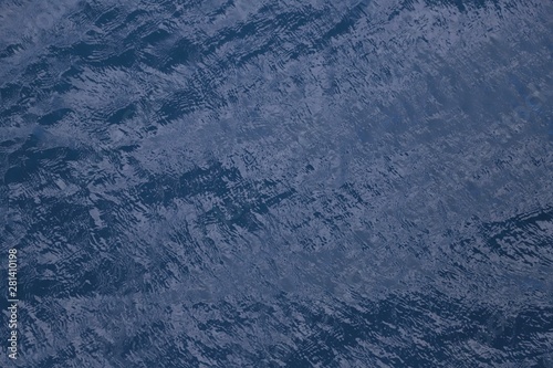 close-up of the water movements of a blue sea