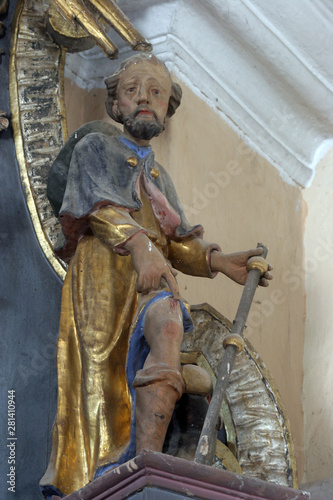 Saint Roch, statue on the altar of the Our Lady in the Church of Saint Mary Magdalene in Cazma, Croatia photo