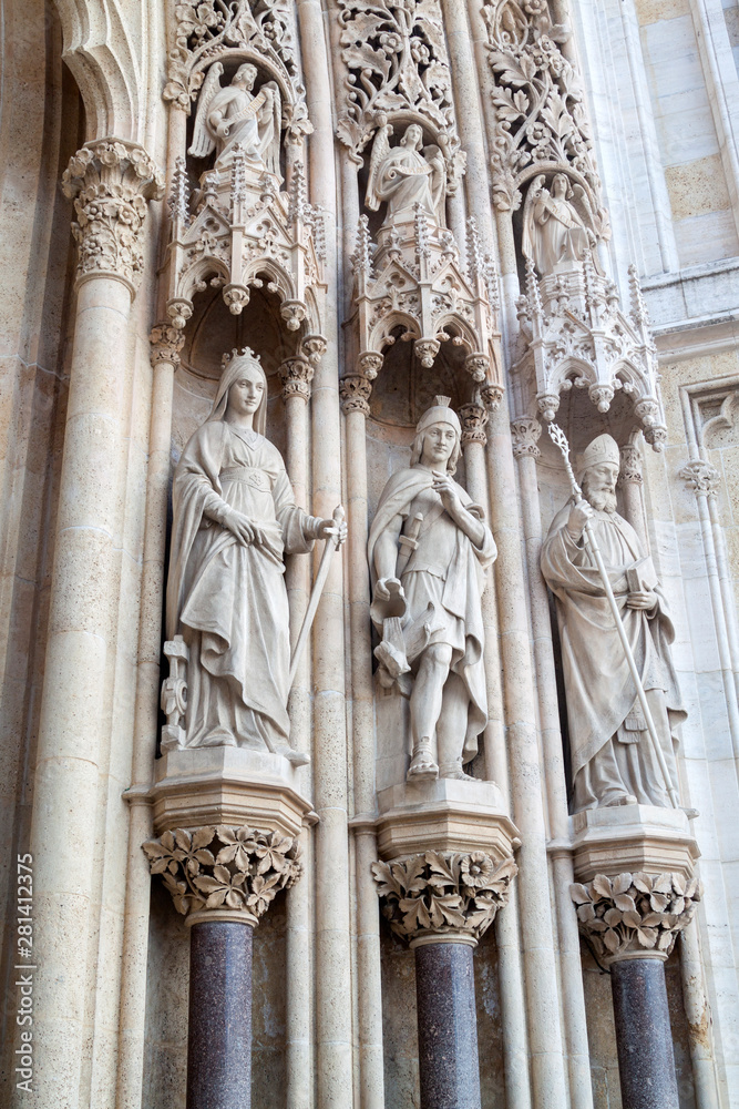 Statues of St. Catherine, St. Florian and St. Cyril, located to right of entrance of Cathedral of Assumption of Blessed Virgin Mary, Zagreb, Croatia Statues of St. Catherine, St. Florian and St. Cyril, located to right of entrance of Cathedral of Assumption of Blessed Virgin Mary, Zagreb, Croatia