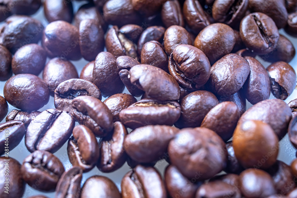 Fototapeta premium Coffee Beans Background. Close Up fresh roasted brown