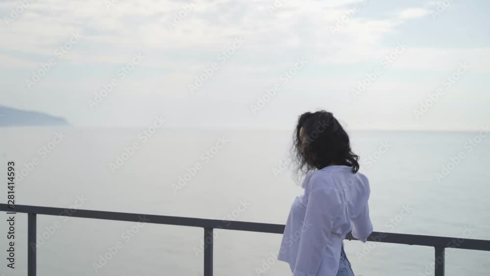 Beautiful girl Tatar posing near the sea Beautiful girl Tatar posing near the sea