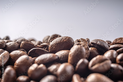 Coffee Beans Background. Close Up fresh roasted brown