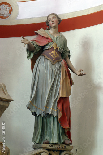 Saint Lucia, statue on the main altar in the church of Saint Barbara in the Bedkovcina, Croatia © zatletic