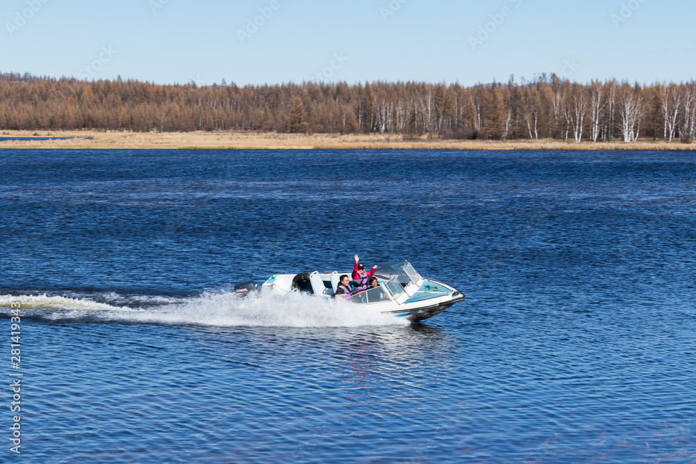 Fototapeta premium Speedboat with high speed on the surface