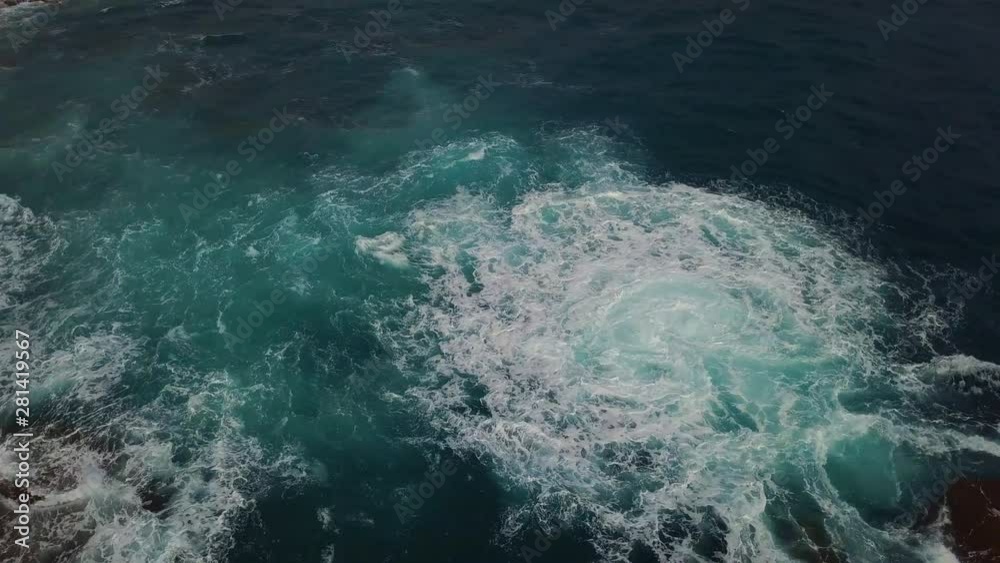 Aerial Shot Of Waves Above Sea. Blue Ocean Background Aerial Shot Of Waves Above Sea. Blue Ocean Background