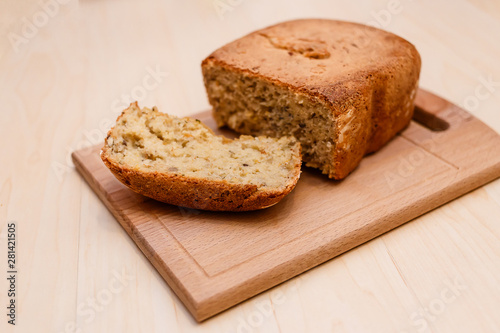 a cut loaf of homemade multi-slag bread on a Board