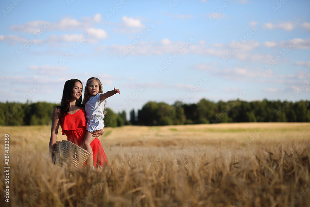 Summer landscape and a girl on nature walk in the countryside. Summer landscape and a girl on nature walk in the countryside.