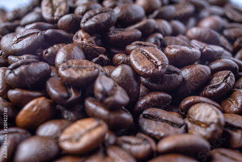 Coffee Beans Background. Close Up fresh roasted brown