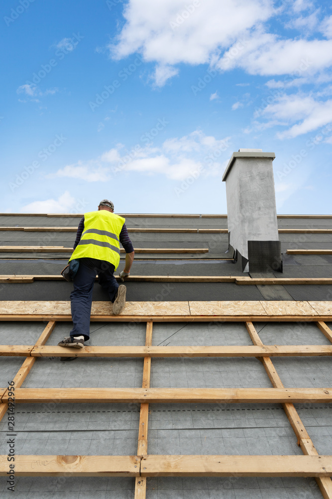 Building construction process of new wooden roof on wood frame house Building construction process of new wooden roof on wood frame house