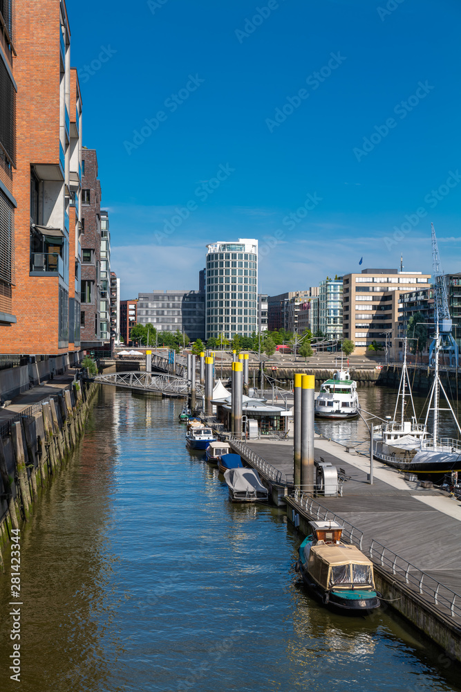 Hamburg, Germany. The Traditional Port (German: Traditionsschiffhafen or Sandtorhafen) on a sunny day. It is located in the Harbor District (Hafencity).