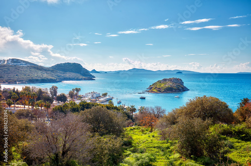 Fototapeta Naklejka Na Ścianę i Meble -  Beautiful landscape view of touristic Gumusluk bay and rabbit island in Bodrum, Mugla, Turkey