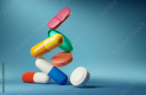 Medical balancing act. A group of medicine pills and antibiotics balancing on top of each other. 3D render illustration. photo