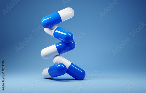 A stack of antibiotic pill capsules on a blue background. 3D render illustration.
