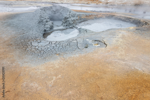 Hverir Namafjall colorful geothermal place in Iceland. Fumaroles volcanic boiling mud pots, surrounded by sulfur hot springs.