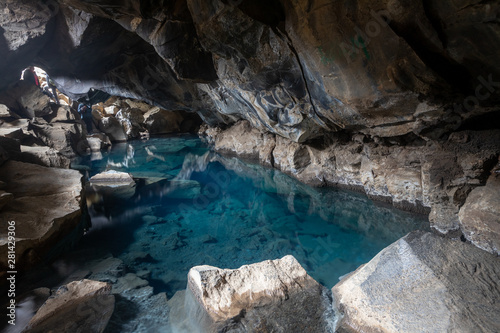 Grjotagja volcanic cave with blue hot thermal water near Lake Myvatn. The geothermal cave  areas of Iceland present in the Throne of Swords. The thermal bath in a grotto