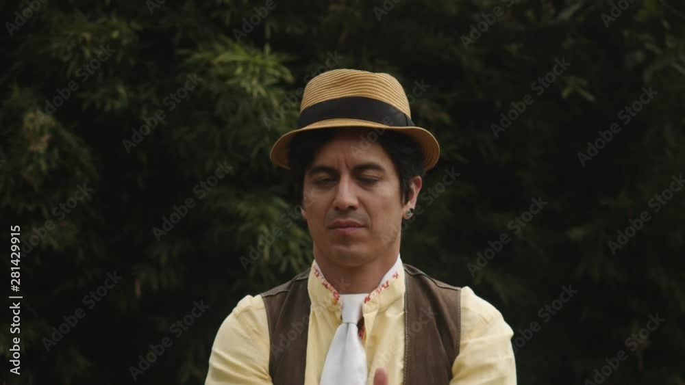 Medium Shot Of A Circus Performer Who Is Mastering A Juggling Trick Using A Crystal Ball While Practising Different Facial Expressions And Making Funny Faces Medium Shot Of A Circus Performer Who Is Mastering A Juggling Trick Using A Crystal Ball While Practising Different Facial Expressions And Making Funny Faces